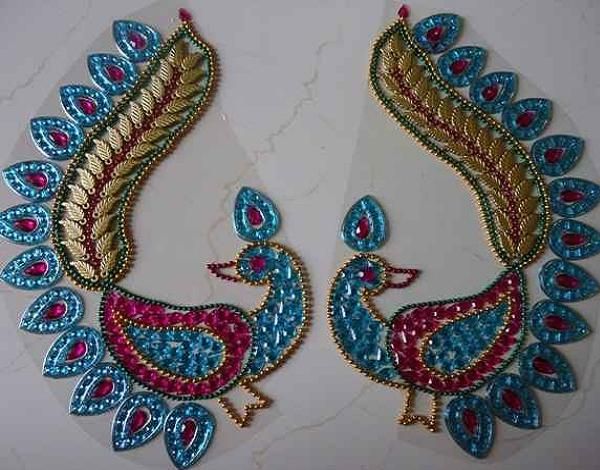 peacock kundan rangoli design 