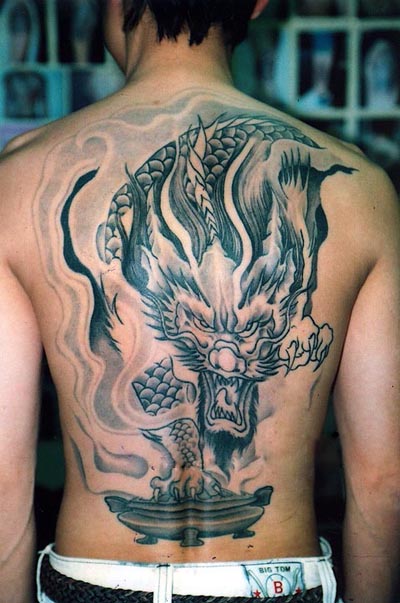 Tribal Raven Tattoo On Back For Men