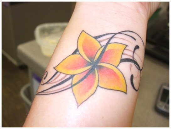 flower shape colored wrist tattoo design 