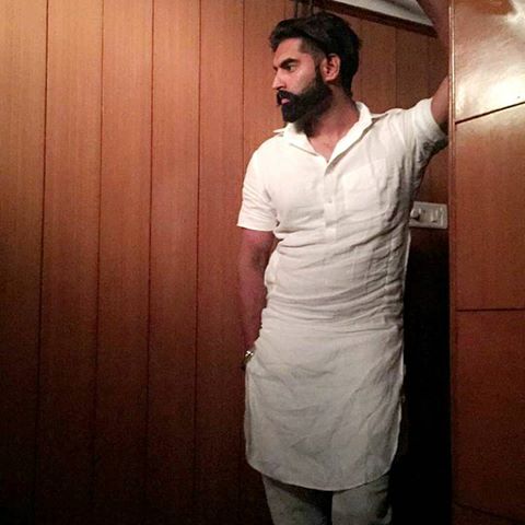 permish verma poses in white kurta pajama